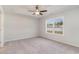 Bright bedroom featuring a ceiling fan and a large window offering ample natural light at 608 Woodside Dr., Conway, SC 29526