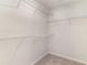 Walk-in closet with ample storage space, featuring wire shelving for organization at 608 Woodside Dr., Conway, SC 29526