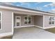 Covered patio with ceiling fan, providing a cool, comfortable outdoor living space at 608 Woodside Dr., Conway, SC 29526