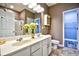 Bathroom featuring double sinks, walk-in shower, and cabinet at 6172 Catalina Dr. # 515, North Myrtle Beach, SC 29582