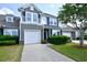 Charming two-story home features a one-car garage, balcony and well-maintained landscaping and a manicured lawn at 6172 Catalina Dr. # 515, North Myrtle Beach, SC 29582