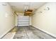Clean garage with functional storage platform, and a white door, providing ample space for vehicles and storage at 6172 Catalina Dr. # 515, North Myrtle Beach, SC 29582