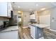 Well-designed kitchen with island, featuring granite countertops, stainless steel appliances and ample cabinet space at 6172 Catalina Dr. # 515, North Myrtle Beach, SC 29582