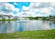 Scenic pond with fountain feature offering a tranquil view from surrounding homes at 6172 Catalina Dr. # 515, North Myrtle Beach, SC 29582