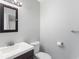Clean bathroom featuring a modern sink, toilet and mirror at 6304 Timberline Dr. # B, Myrtle Beach, SC 29572