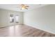 Bedroom with hardwood floors, neutral walls and access to a private backyard at 6304 Timberline Dr. # B, Myrtle Beach, SC 29572