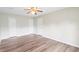 Bright bedroom with neutral walls and laminated floors under a ceiling fan at 6304 Timberline Dr. # B, Myrtle Beach, SC 29572