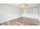 Bedroom features a fan, neutral walls and laminated floors at 6304 Timberline Dr. # B, Myrtle Beach, SC 29572