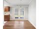 Dining room with wood floors and french doors leading to the backyard at 6304 Timberline Dr. # B, Myrtle Beach, SC 29572