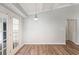Dining room with wood floors and french doors leading to the backyard at 6304 Timberline Dr. # B, Myrtle Beach, SC 29572