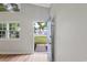 Light-filled entryway with wood flooring and view of the neighborhood at 6304 Timberline Dr. # B, Myrtle Beach, SC 29572