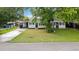 Charming one-story home with well-maintained front yard and attached carport at 6304 Timberline Dr. # B, Myrtle Beach, SC 29572