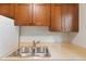 Kitchen sink featuring stainless steel double basin and neutral countertops at 6304 Timberline Dr. # B, Myrtle Beach, SC 29572