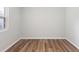 Room offering natural light, hardwood floors, and neutral walls at 6304 Timberline Dr. # B, Myrtle Beach, SC 29572