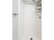 Clean and bright shower with a mounted shower head, corner shelves and grab bar at 6304 Timberline Dr. # B, Myrtle Beach, SC 29572