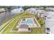 Aerial view of community pool and surrounding condos near a waterway at 633 Waterway Village Blvd # 11D, Myrtle Beach, SC 29579
