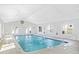 Indoor pool with ample natural lighting and exit door for easy pool access at 633 Waterway Village Blvd # 11D, Myrtle Beach, SC 29579