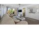 Inviting living room with comfortable seating, tv, and sliding glass doors leading to a balcony at 633 Waterway Village Blvd # 11D, Myrtle Beach, SC 29579