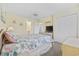 Bright and airy main bedroom with ample closet space and access to the ensuite bathroom at 633 Waterway Village Blvd # 11D, Myrtle Beach, SC 29579