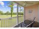 Cozy outdoor patio with a golf course view, perfect for relaxing and enjoying the natural scenery at 633 Waterway Village Blvd # 11D, Myrtle Beach, SC 29579