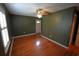 Living room featuring hardwood floors, natural light, and neutral paint at 669 George Washington Trail, Georgetown, SC 29440