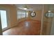 Sunny sunroom featuring tile floors, shutters, ceiling fans, and access to the backyard at 669 George Washington Trail, Georgetown, SC 29440