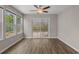 Inviting dining area features sliding glass doors, and large windows offering abundant sunlight at 691 Sandberg St., Surfside Beach, SC 29575