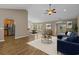 Bright and airy living room showcasing hardwood floors, neutral decor, and open layout at 691 Sandberg St., Surfside Beach, SC 29575