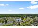 Beautiful aerial view of the community with mature trees and pond at 696 Rambler Ct at 696 Rambler Ct., Myrtle Beach, SC 29588