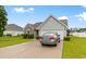 Charming single-Gathering home with a two-car garage, landscaped yard, and a private driveway at 696 Rambler Ct., Myrtle Beach, SC 29588