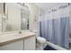 Well-lit bathroom with a shower and a single sink vanity at 760 Charter Dr. # D-4, Longs, SC 29568