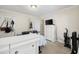 Cozy bedroom with a white dresser and a tv for entertainment at 760 Charter Dr. # D-4, Longs, SC 29568