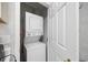 Efficient laundry area with stacked washer and dryer for space-saving convenience at 760 Charter Dr. # D-4, Longs, SC 29568
