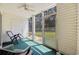 Comfortable screened porch with view of the backyard at 760 Charter Dr. # D-4, Longs, SC 29568