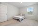 Comfortable bedroom with neutral carpet, natural light and ample space for a full-size bed at 787 Dusty Pine Way, Myrtle Beach, SC 29588