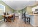 Open-concept living space featuring a dining area, kitchen, and comfortable living room at 787 Dusty Pine Way, Myrtle Beach, SC 29588