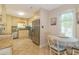 Charming kitchen features stainless steel appliances and a cozy breakfast nook with natural light at 8 Martinique Dr., Myrtle Beach, SC 29572
