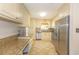 Well-lit kitchen with stainless steel appliances, granite countertops and ample cabinet space at 8 Martinique Dr., Myrtle Beach, SC 29572