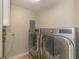 Laundry area with modern washer and dryer at 8 Martinique Dr., Myrtle Beach, SC 29572