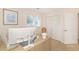Bright office space with large closet, neutral decor, and natural light from the shuttered window at 8 Martinique Dr., Myrtle Beach, SC 29572