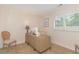 Bright office space features a light wood desk, natural light from shuttered window, and neutral decor at 8 Martinique Dr., Myrtle Beach, SC 29572
