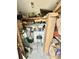 Well-organized storage space with shelving, various tools, and ample room for household items at 8 Martinique Dr., Myrtle Beach, SC 29572
