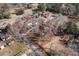 Aerial view of the home with approximate boundaries marked on a wooded lot close to the road at 822 Highway 90, Conway, SC 29526