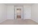 Bedroom featuring two doors, neutral walls and plush carpet at 850 Farmers Passage Loop, Loris, SC 29569