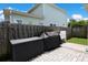 Back patio with black storage box and utility sink, all built on paver stones at 867 Cardinal Pl., North Myrtle Beach, SC 29582