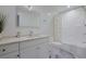 Well-lit bathroom with modern fixtures, a marble countertop, and a shower-tub combination at 867 Cardinal Pl., North Myrtle Beach, SC 29582