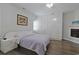 Bright bedroom featuring hardwood floors, a ceiling fan, a modern bed frame and a built in wardrobe at 867 Cardinal Pl., North Myrtle Beach, SC 29582
