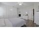 Bright bedroom featuring hardwood floors, a ceiling fan, fireplace and built in wardrobe at 867 Cardinal Pl., North Myrtle Beach, SC 29582
