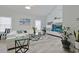 Bright living room with a vaulted ceiling, stylish furniture, light-colored walls, and plenty of natural light at 867 Cardinal Pl., North Myrtle Beach, SC 29582