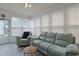 Cozy sunroom with comfortable seating, tile floors, and plenty of natural light at 867 Cardinal Pl., North Myrtle Beach, SC 29582